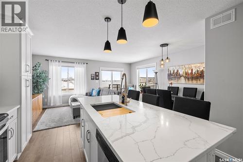 145 Plains Circle, Pilot Butte, SK - Indoor Photo Showing Kitchen With Upgraded Kitchen