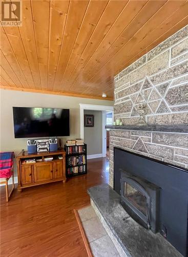 29 Sidney Lane, Mindemoya, ON - Indoor Photo Showing Living Room With Fireplace
