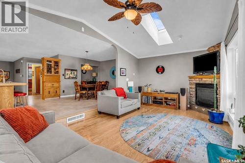 1534 9Th Avenue N, Saskatoon, SK - Indoor Photo Showing Living Room With Fireplace