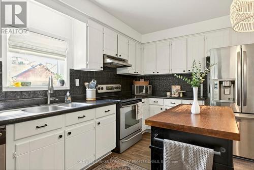 181 Simcoe Street E, Hamilton, ON - Indoor Photo Showing Kitchen With Double Sink