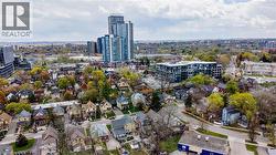 Aerial perspective showcasing a residential neighborhood with a diverse mix of architectural styles - 