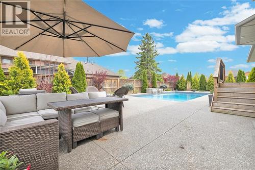 2048 Eugeni, Tecumseh, ON - Outdoor With In Ground Pool