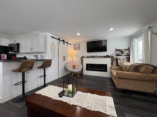 1026 Third Street E, Fort Frances, ON - Indoor Photo Showing Living Room With Fireplace