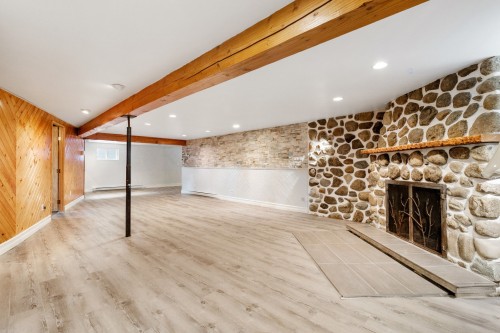Salle familiale - 46 Rue De Varsovie, Laval (Vimont), QC - Indoor Photo Showing Other Room With Fireplace