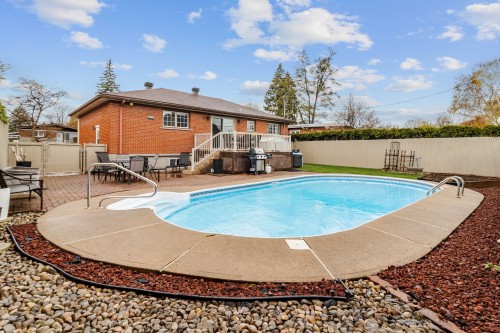 Cour - 46 Rue De Varsovie, Laval (Vimont), QC - Outdoor With In Ground Pool With Deck Patio Veranda
