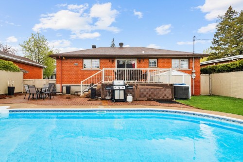 Cour - 46 Rue De Varsovie, Laval (Vimont), QC - Outdoor With In Ground Pool With Deck Patio Veranda