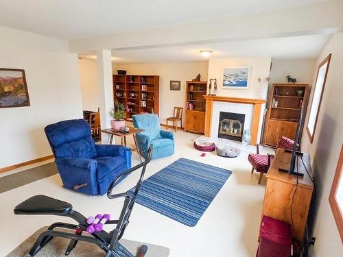 227 Transmitter Road, Kenora, ON - Indoor Photo Showing Living Room With Fireplace