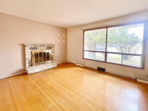 45 Dingwall Parkway, Dryden, ON - Indoor Photo Showing Living Room With Fireplace