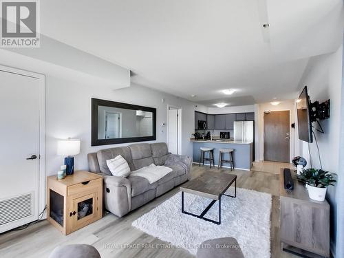 221 - 3060 Rotary Way, Burlington, ON - Indoor Photo Showing Living Room With Fireplace