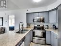 221 - 3060 Rotary Way, Burlington, ON  - Indoor Photo Showing Kitchen With Double Sink 