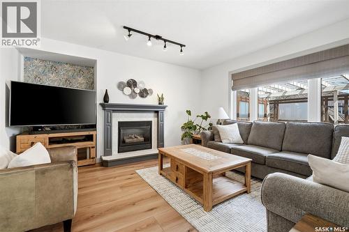1603 Rousseau Crescent, Regina, SK - Indoor Photo Showing Living Room With Fireplace