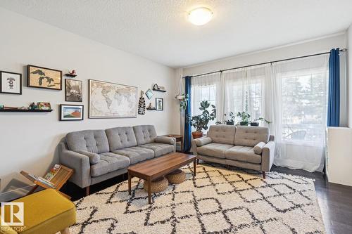 9919 79 St Nw, Edmonton, AB - Indoor Photo Showing Living Room
