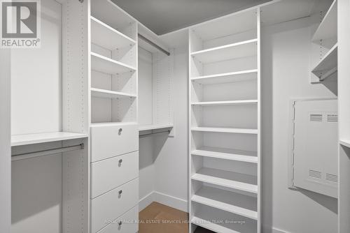 Walk-in closet with custom built-ins - 606 - 1414 Bayview Avenue, Toronto, ON - Indoor With Storage