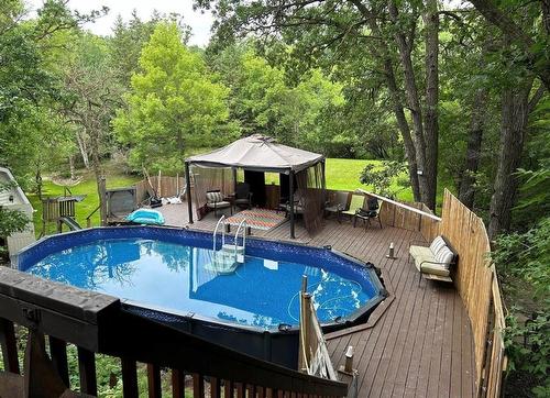 106 Braeview Place, Brandon, MB - Outdoor With Above Ground Pool With Backyard
