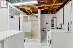 Laundry room with shower area - 