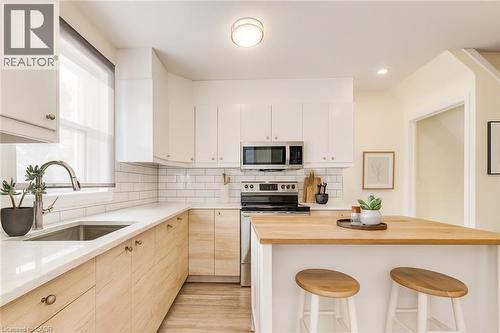 Virtually Staged - 284 Westcourt Place, Waterloo, ON - Indoor Photo Showing Kitchen With Upgraded Kitchen