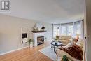 11 Bonniewood Drive, Mapleton, ON  - Indoor Photo Showing Living Room With Fireplace 
