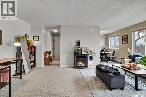11 1604 Main Street, Saskatoon, SK - Indoor Photo Showing Living Room With Fireplace