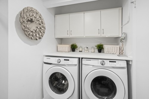 Salle de lavage - 109-4520 Prom. Paton, Laval (Chomedey), QC - Indoor Photo Showing Laundry Room