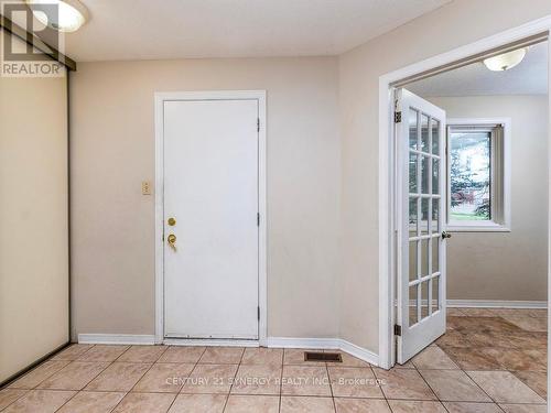 Foyer with inside entry, closets and powder room. - 1 Winnegreen Court, Ottawa, ON 