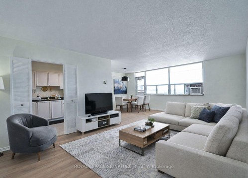 1015-2550 Pharmacy Avenue, Toronto, ON - Indoor Photo Showing Living Room