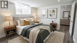 Bedroom featuring wood-finish flooring and recessed lighting - 