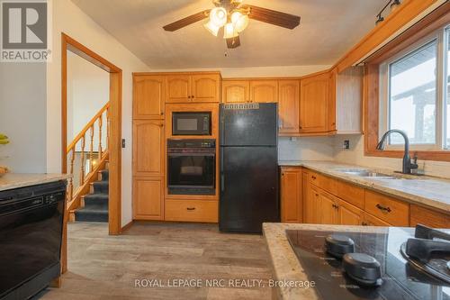 Kitchen with Ample Storage and Granite Counters - 8010 Silver Street, West Lincoln (West Lincoln), ON 