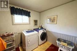 Bedroom 3 (or Main Floor Laundry) - 