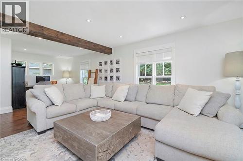 Family room with view to generous side yard - 58 Central Drive, Hamilton, ON 