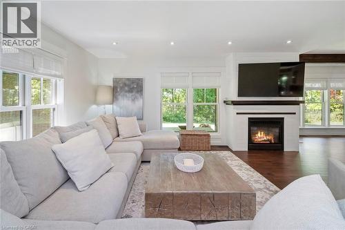 Living room with gas fireplace - 58 Central Drive, Hamilton, ON 