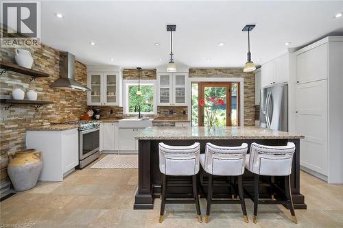 Kitchen with view to backyard - 58 Central Drive, Hamilton, ON 