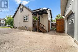 tons of parking - fenced side entranc - 