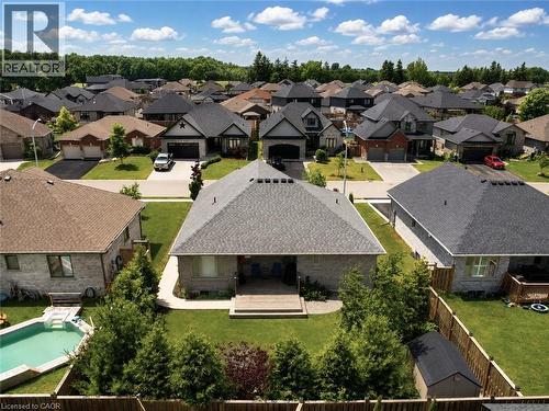 Aerial perspective highlighting the property's rear exterior and surrounding neighborhood - 98 Allandale Crescent, Simcoe, ON - Outdoor