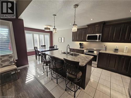 Eat-in Kitchen - 98 Allandale Crescent, Simcoe, ON - Indoor Photo Showing Kitchen With Stainless Steel Kitchen With Double Sink