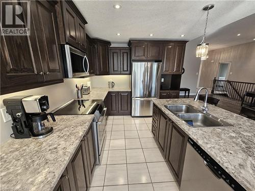 Under-cabinet lighting - 98 Allandale Crescent, Simcoe, ON - Indoor Photo Showing Kitchen With Stainless Steel Kitchen With Double Sink With Upgraded Kitchen