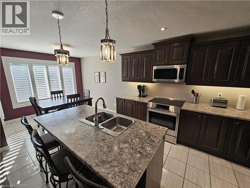Eat-in Kitchen - 98 Allandale Crescent, Simcoe, ON - Indoor Photo Showing Kitchen With Double Sink