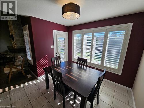 Garden door to covered rear deck - 98 Allandale Crescent, Simcoe, ON - Indoor Photo Showing Dining Room