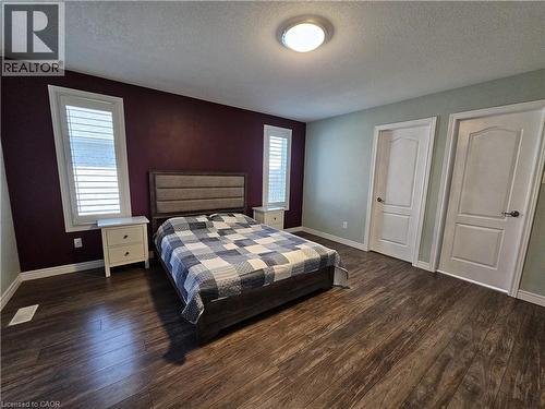Primary Bedroom with ensuite & walk-in closet - 98 Allandale Crescent, Simcoe, ON - Indoor Photo Showing Bedroom