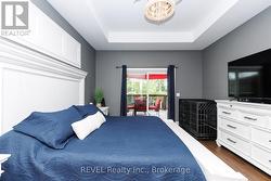 Primary bedroom with sliding doors to deck - 