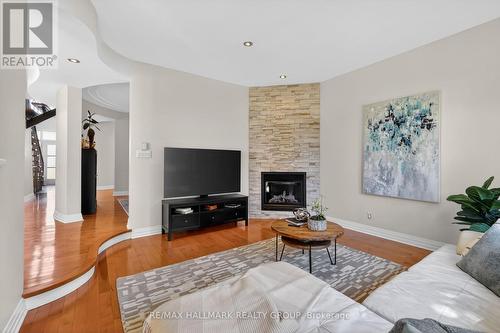 Warm and inviting sunken family room with fireplac - 1934 Lenester Avenue, Ottawa, ON 