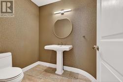 Elegant main floor powder room - 