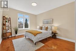 Bright guest bedroom with south-facing windows - 