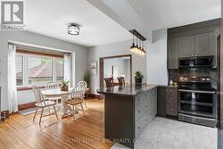 Breakfast bar off modern kitchen - 