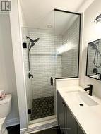 Glass and tile shower with rain shower head - 