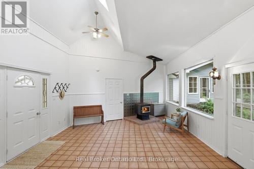 Mudroom with wood stove - 805500 25 Side Road, Grey Highlands, ON 