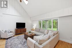 Living room w/ cathedral ceilings - 