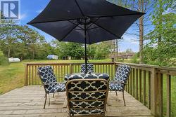 View from back deck towards backyard. - 