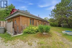 Side view of laundry and stairs to basement - 