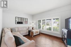 TV room with sliding door to main entrance - 