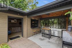 Garage door and sliding window at seating bar - 